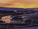 Sunset view of Firehole River and Geysers in Old Faithful Area