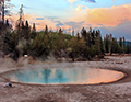 West Thumb Geyser Basin thermal pool at sunset