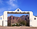 Hacienda Gate with Superstition Mountains in Background