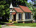 Handwerker Gingerbread House behind Woodruff-Fontaine Home in Victorian Village