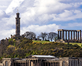 The Admiral Nelson Monument (left) and the National Monument of Scotland (right)