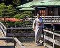 Hama-rikyu Gardens and traditionally dressed local visitor